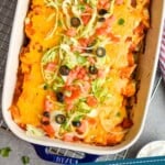 pinterest graphic overhead of a casserole dish filled with baked burritos