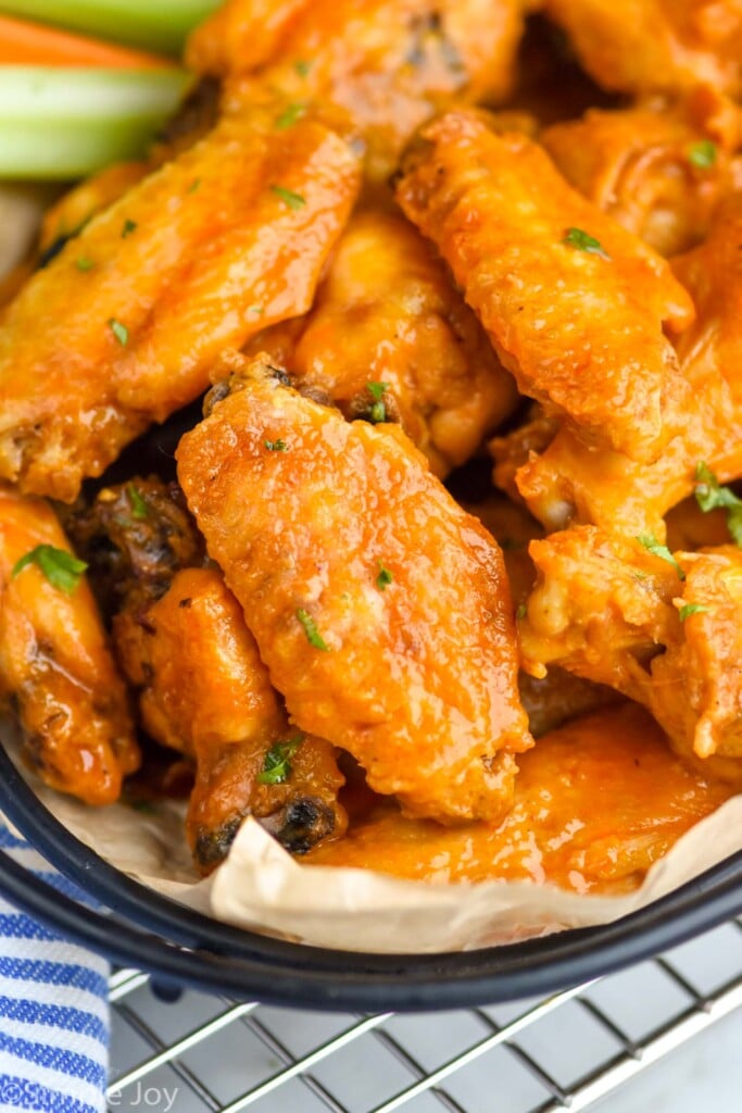 close up of an oven baked chicken wing