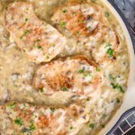 overhead of a skillet with cream of mushroom pork chops - 10