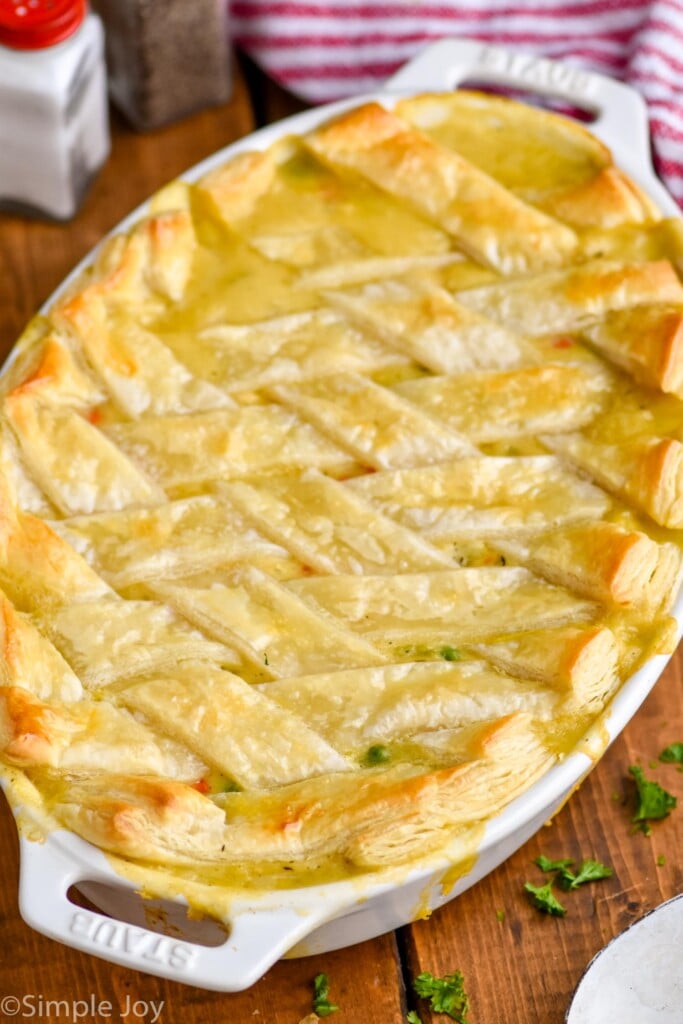 side view of easy chicken pot pie casserole in a white oval casserole dish