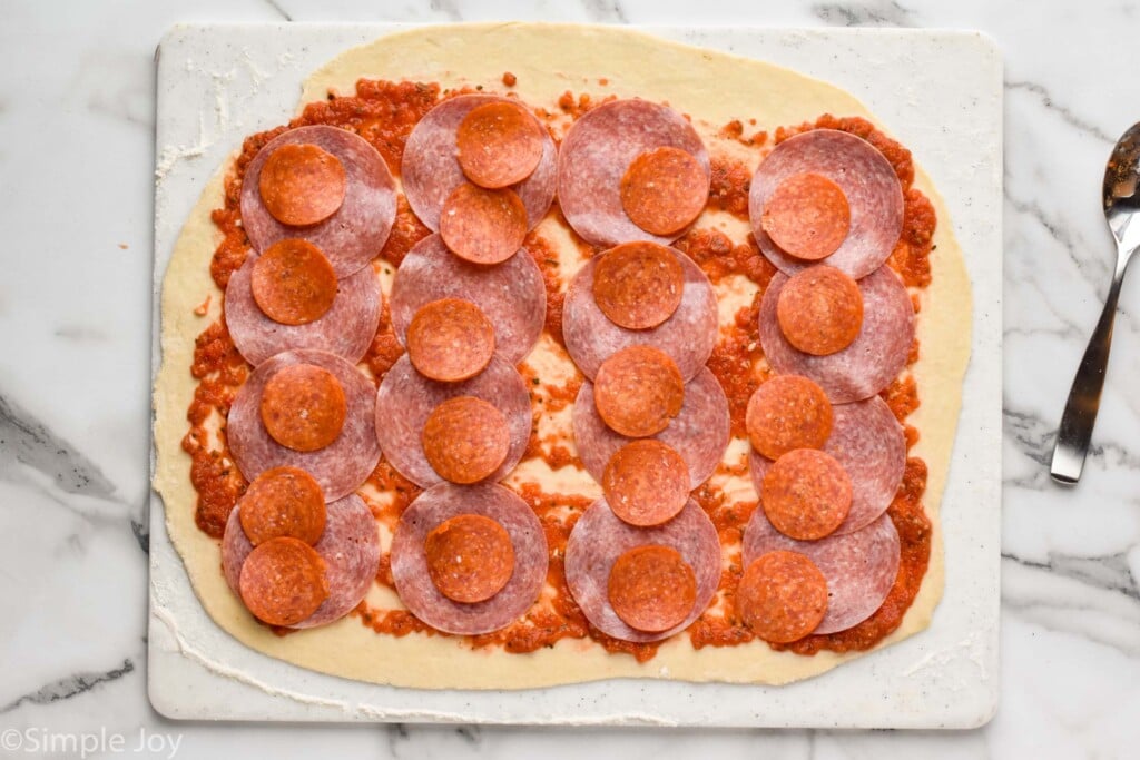 overhead picture stromboli with salami, and pepperoni
