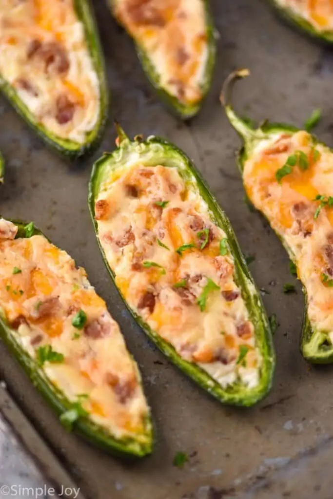jalapeno poppers on a baking tray