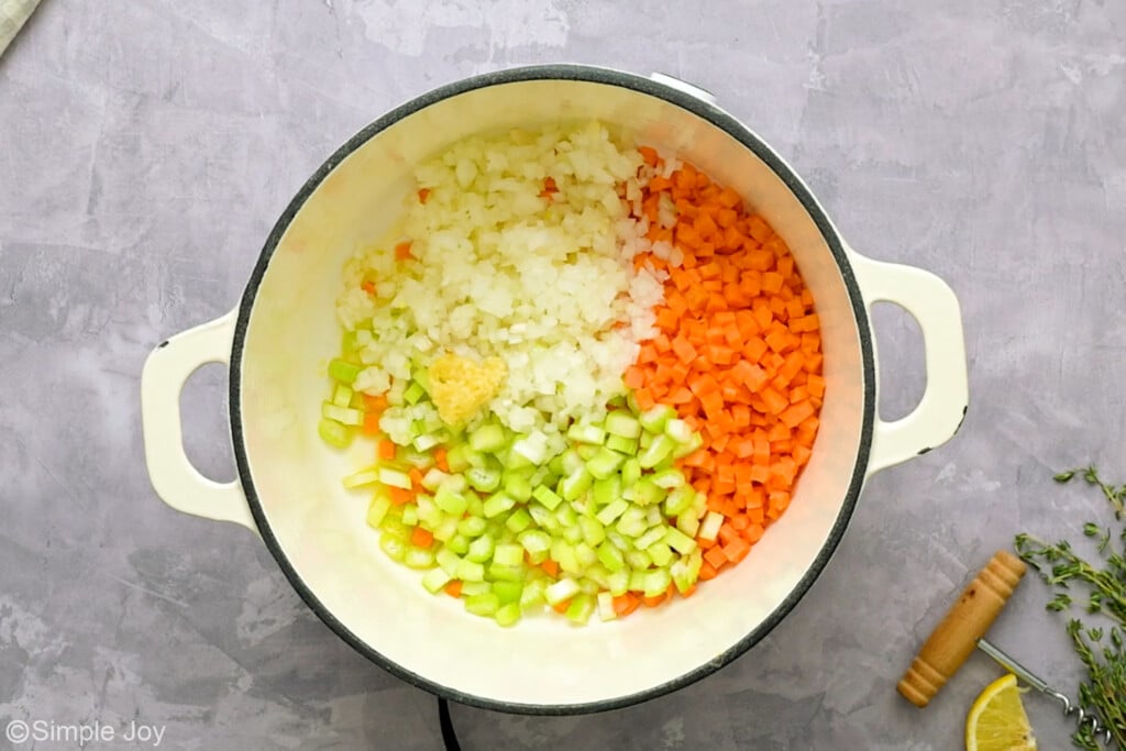 overhead of a large pot with vegetables in it to saute them - 8
