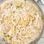 overhead of a pan of salmon alfredo - 8