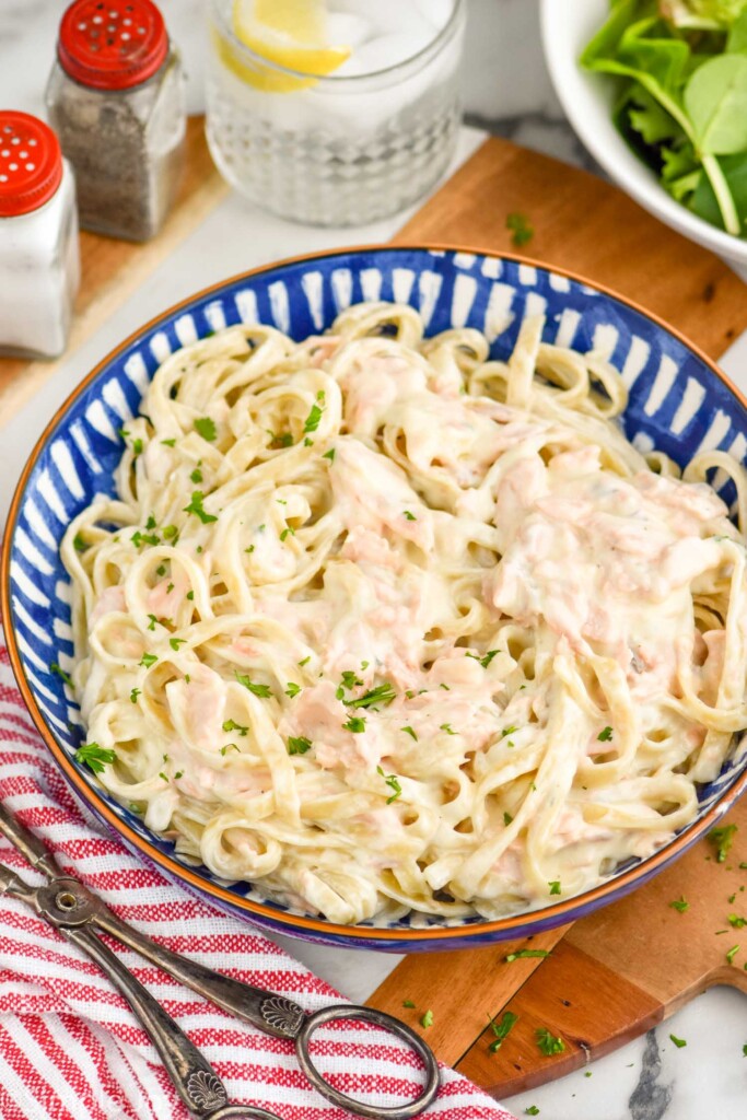 a bowl fo salmon Alfredo Pasta