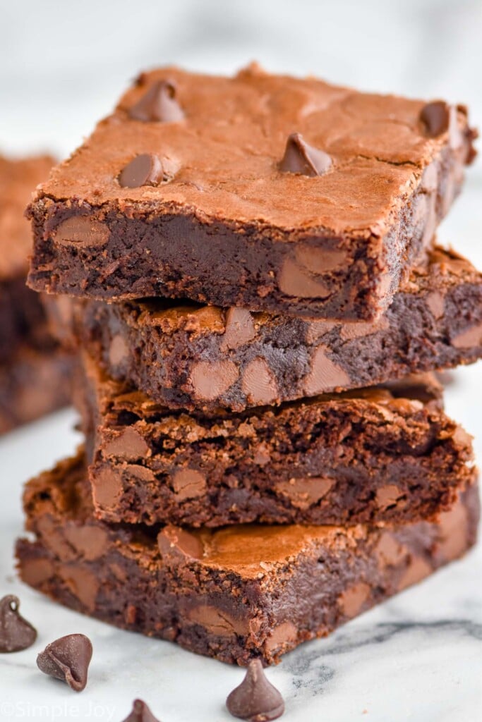 a stack of four chocolate chip brownies