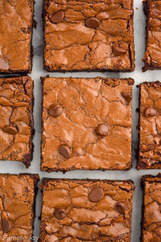 overhead of 9 chocolate brownies laid out in rows