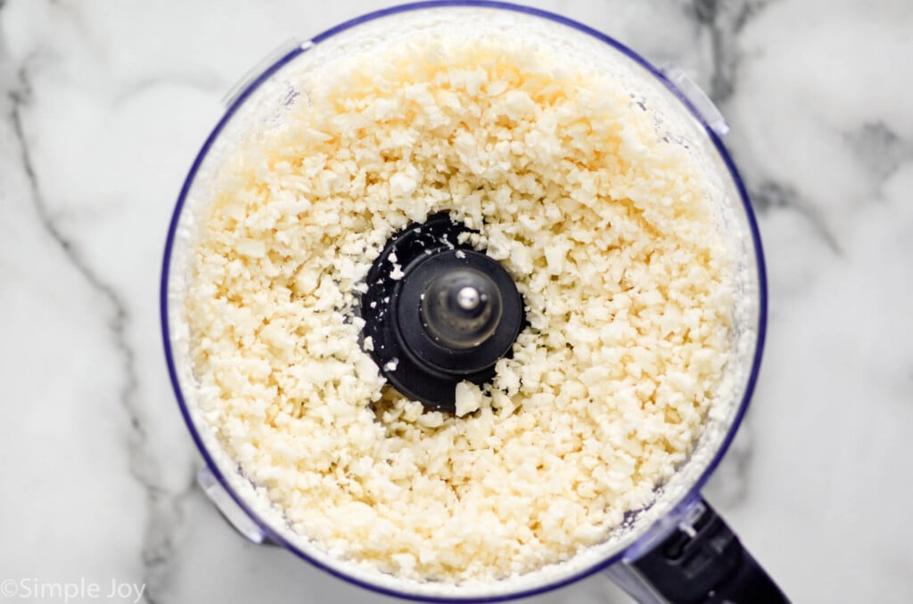 overhead of cauliflower that has been riced in a food processor