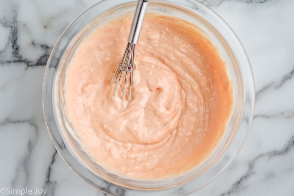 overhead picture of Russian dressing in a bowl whisked up