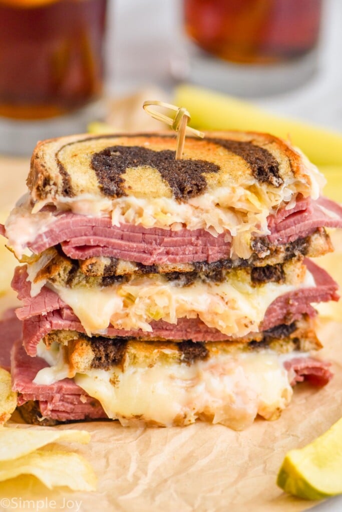 three halves of a Reuben Sandwich stacked 