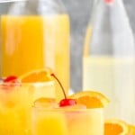 pinterest graphic of side view of an amaretto stone sour recipe in a glass tumbler