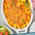 pinterest graphic of overhead of serving spoon in a casserole dish full of chicken divan