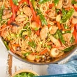 pinterest graphic of overhead of a skillet full of chicken lo mein recipe