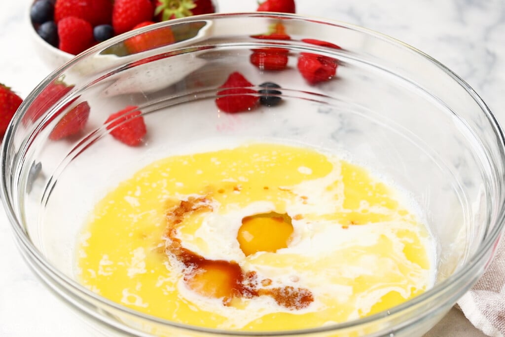 a bowl of wet ingredients for buttermilk pancakes - 8