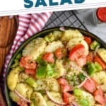 pinterest graphic of overhead of a bowl of italian potato salad in a serving bowl garnished with fresh parsley