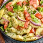 pinterest graphic of side view of a italian potato salad recipe in a serving bowl