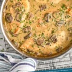 pinterest graphic of overhead of mushroom chicken in a skillet garnished with fresh parsley