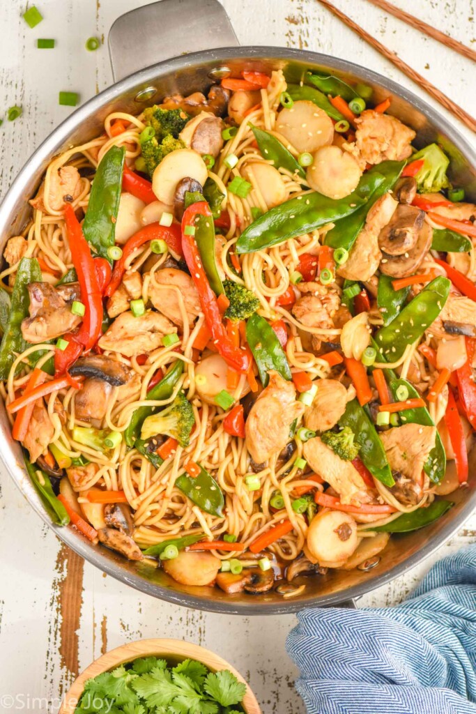 overhead of a skillet full of chicken lo mein recipe