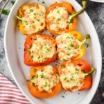 overhead of a casserole dish with chicken stuffed peppers - 11