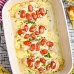 overhead picture of a baking dish full of pesto chicken - 11