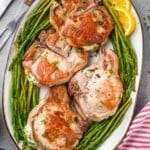 overhead of a platter of stuffed pork chop recipe - 11