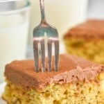 pinterest graphic of piece of banana cake recipe on a plate with a fork pushing into it