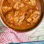 pinterest graphic of overhead of a skillet full of Salisbury steak