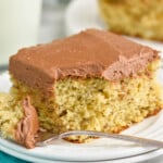 close up picture of a piece of banana cake with a bite missing - 19