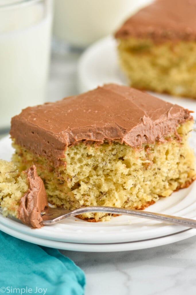 close up picture of a piece of banana cake with a bite missing