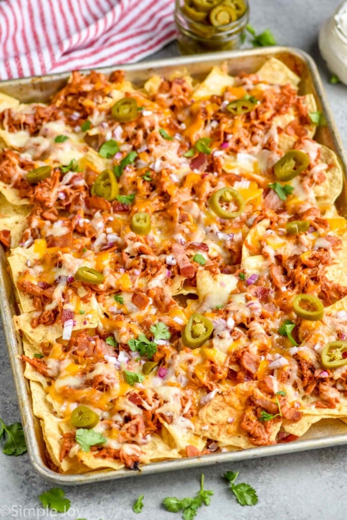 a sheet pan full of chicken nachos recipe made with bbq chicken