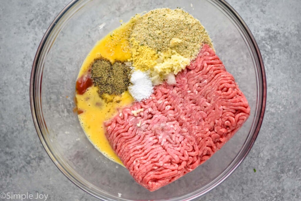 overhead of a bowl of ingredients to make Salisbury steak