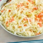 pinterest graphic of side view of a bowl of kfc coleslaw recipe says "coleslaw recipe simplejoy.com"
