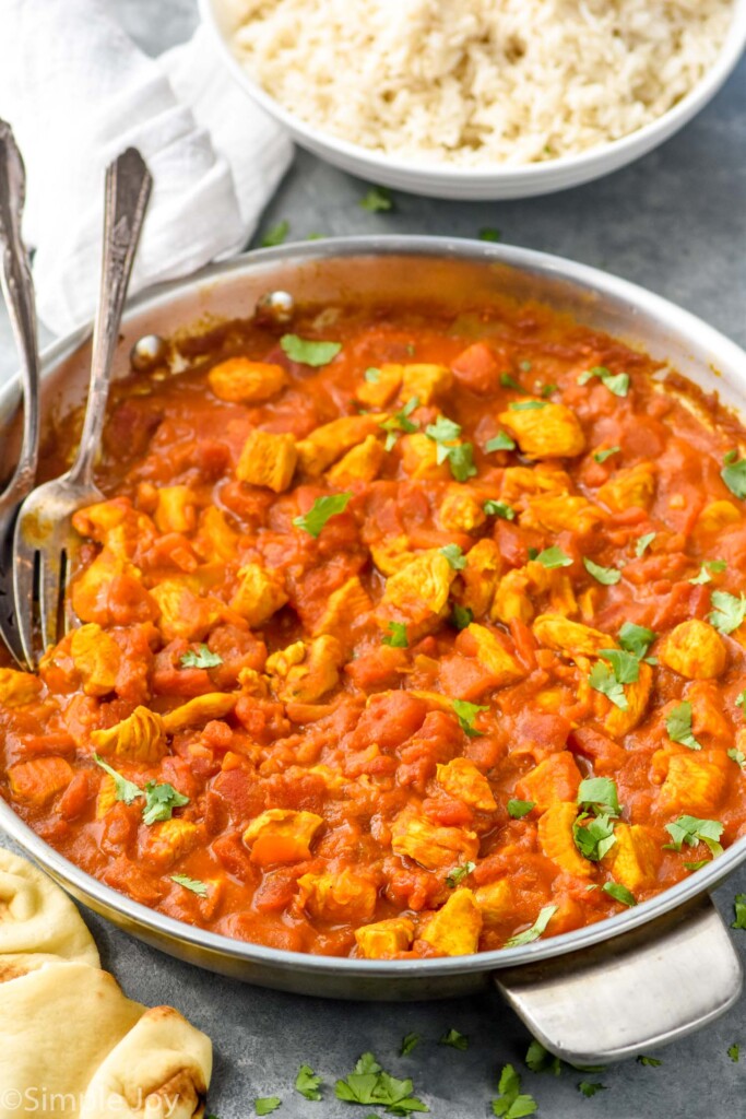 Overhead photo of chicken curry recipe in a pot.