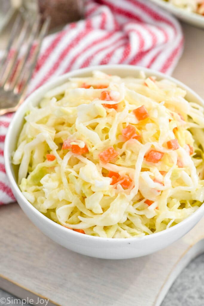 small white bowl full of coleslaw