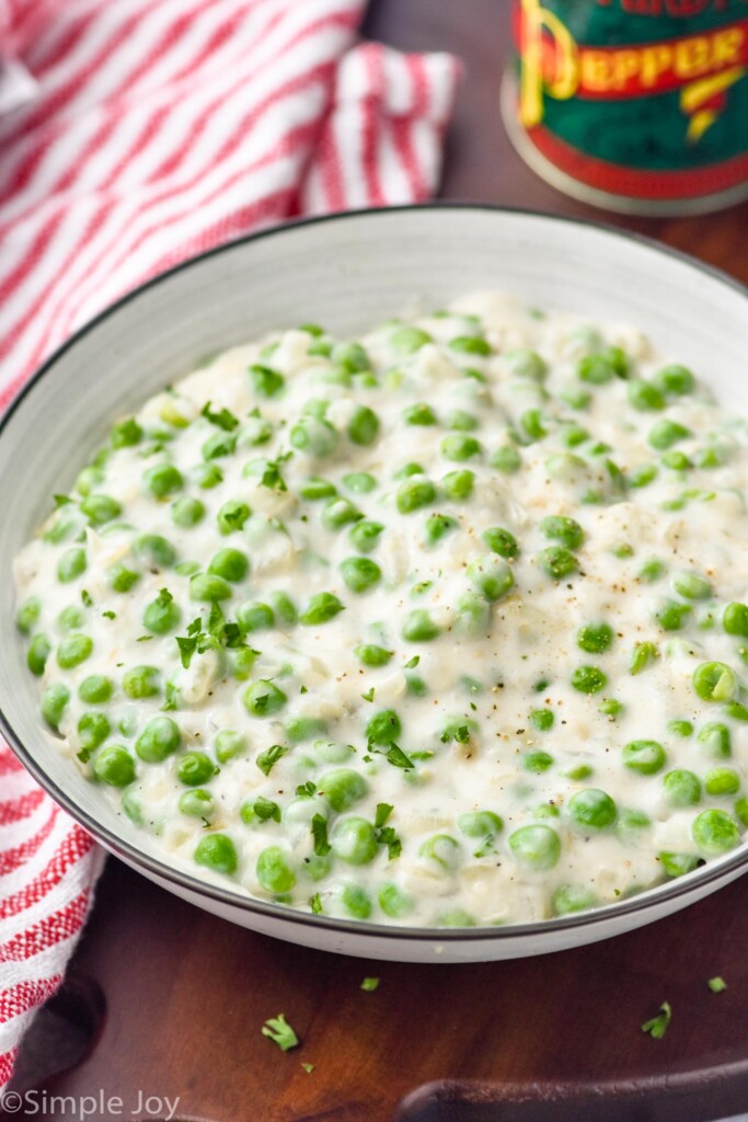 Overhead photo of bowl of creamed peas.