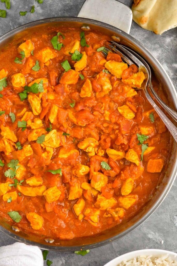 Overhead photo of chicken curry recipe in a pot.