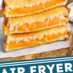 Pinterest graphic of air fryer grilled cheese recipe. Image is photo of a stack of air fryer grilled cheese sandwiches.Bowl of tomato soup sits in the background. Text says, "Air fryer grilled cheese simplejoy.com"