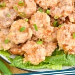 Pinterest graphic of bang bang shrimp recipe. Overhead photo of bang bang shrimp served on a bed of lettuce. Text says, "bang bang shrimp simplejoy.com"