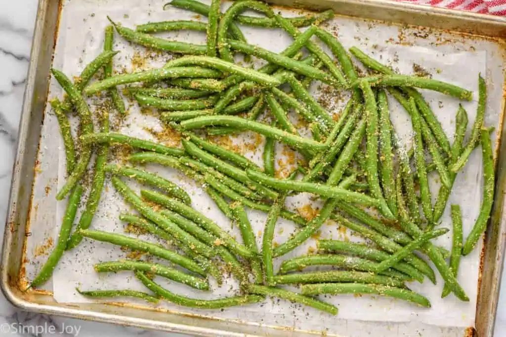 Overhead photo of italian green beans on a baking sheet.