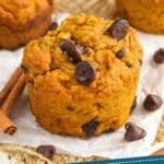 Pinterest graphic for Pumpkin Chocolate Chip Muffins recipe. Photo of Pumpkin Chocolate Chip Muffins. Text says, "Tried and tested pumpkin muffins simplejoy.com"