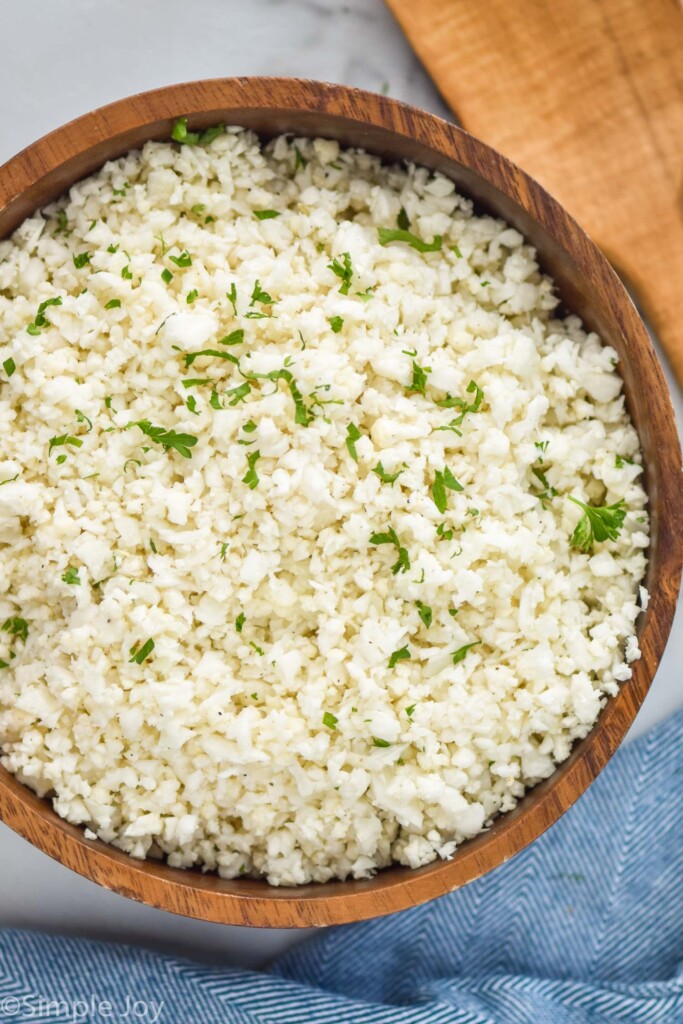 Overhead photo of cauliflower rice recipe in a bowl for serving.