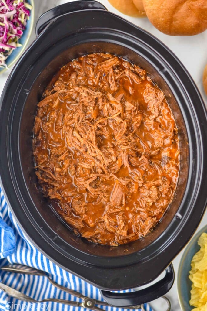 Overhead photo of Dr. Pepper Pulled Pork recipe in a crockpot.