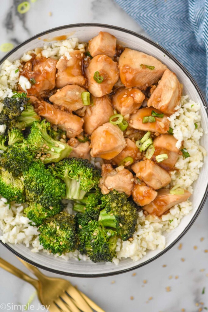 Overhead photo of teriyaki chicken bowl served with broccoli and rice.