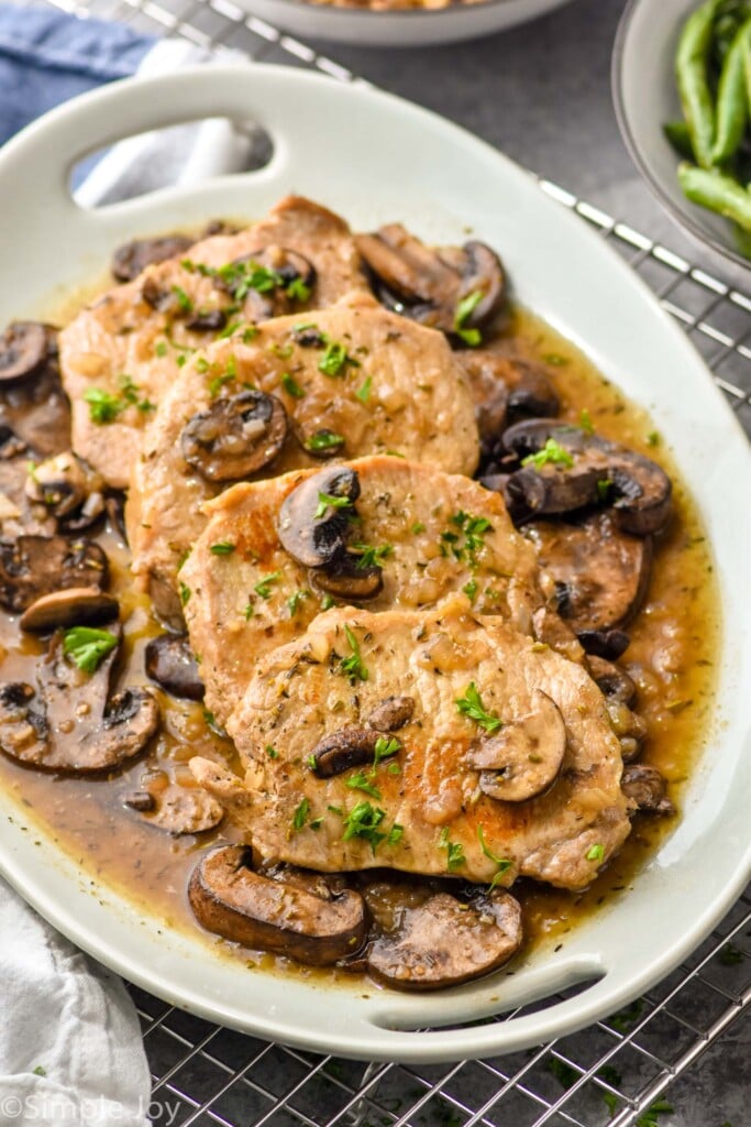 Overhead photo of crock pot pork chops recipe on a serving platter.