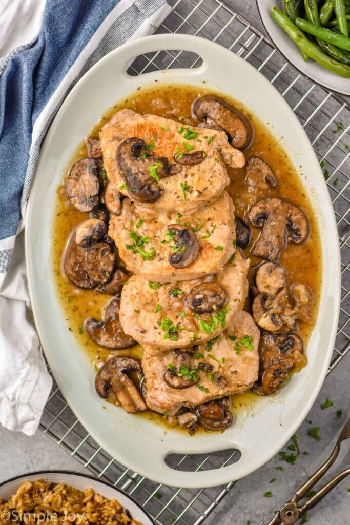 Overhead photo of crock pot pork chops recipe on a serving platter.
