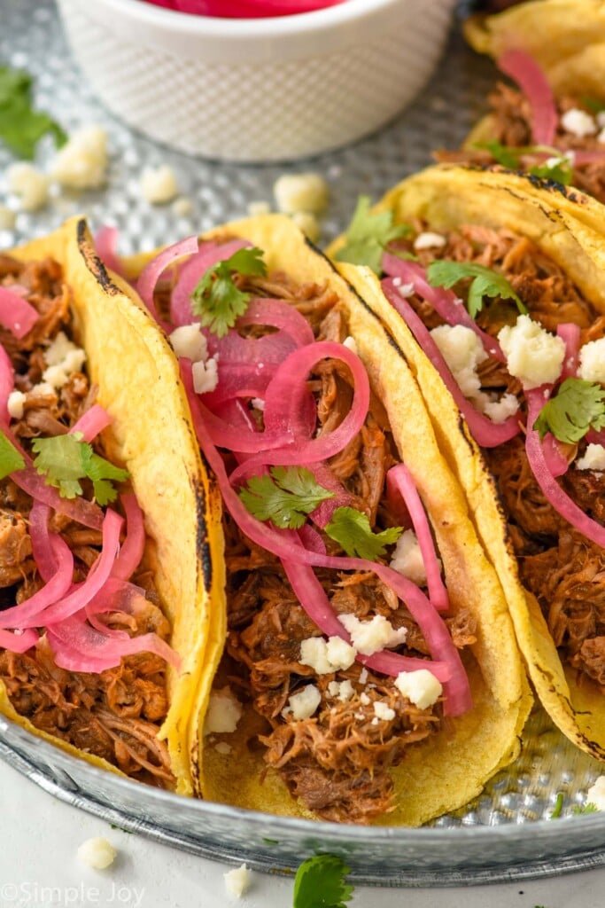 Overhead photo of pulled pork tacos.