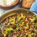 Pinterest graphic of beef teriyaki. Text says "The best beef teriyaki simplejoy.com" Image shows overhead of pan of beef teriyaki with broccoli