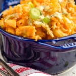 Pinterest graphic for Buffalo Chicken Mac and Cheese recipe. Image is photo of a bowl of Buffalo Chicken Mac and Cheese. Text says, "Amazing Buffalo Mac & Cheese simplejoy.com"