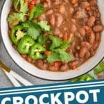 pinterest graphic of overhead of crock pot pinto beans in a bowl, garnished with jalapeños and cilantro, says "crockpot pinto beans, simplejoy.com"