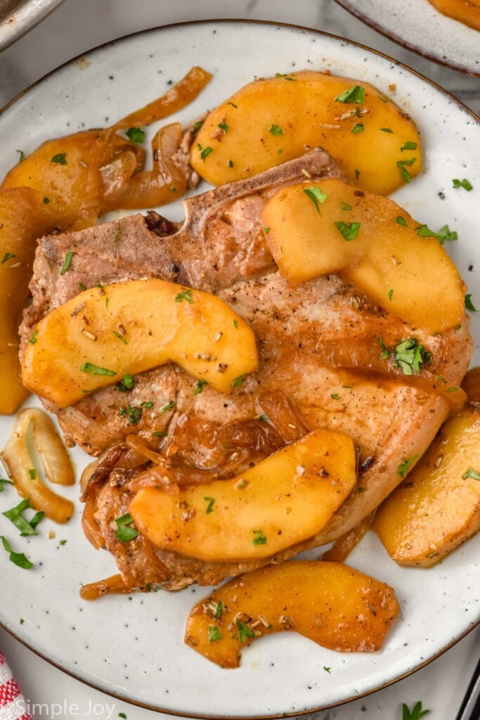 Overhead photo of Pork Chops with Apples served on a plate.